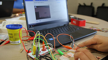 Kids works on computer